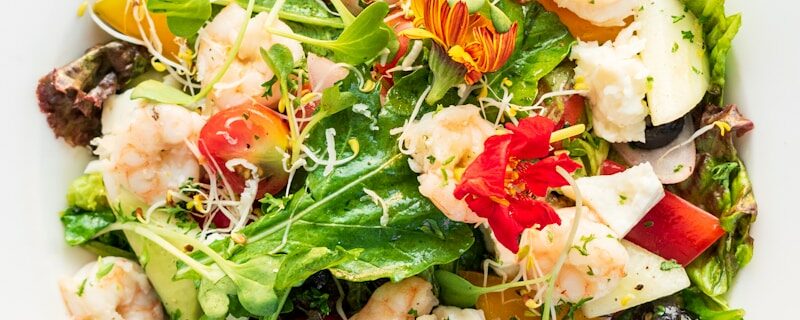 vegetable salad on white ceramic bowl